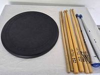All items: drum pad, three wooden pairs, one electronic pair