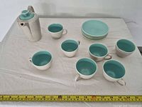 Full set showing teapot, seven cups, six saucers