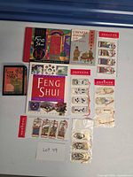 Full lot with books, card deck and bookmark packs visible