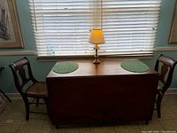 Table front view with leaves down
