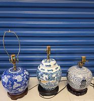 All three porcelain ginger jar lamps on stands