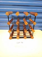 Front view of wood and metal wine rack