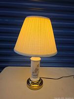 Lamp lit with shade showing overall appearance