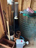 wide view of assorted garden items in shed