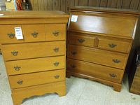 Both honey finish wooden dressers front view