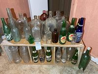 Full view of both shelves showing majority of bottle assortment