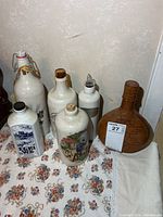 Group view of all seven bottles on table