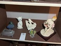 Shelf view showing all six items in lot