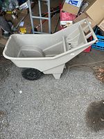 Side view showing overall cart shape and wheels