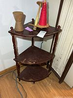 full view of shelf with bobbins placed on top
