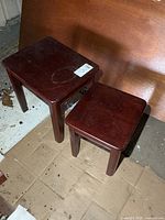 Both wood side tables, different sizes, showing overall form and finish