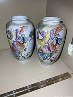 Front view of both porcelain vases