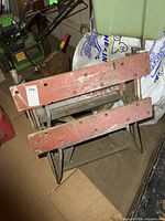 Folded WorkMate showing wooden jaws and metal frame
