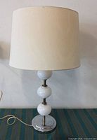 Full view of lamp with shade unplugged