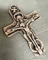 Front view of crucifix showing Holy Trinity design