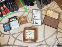 Group shot of all frames and clock