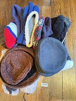 Group shot showing all hats layered together