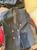 navy double-breasted blazer with gold buttons