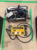 Mastercraft power bar and bin of mixed cables