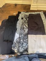 Stack of assorted skirts showing variety of colors and patterns