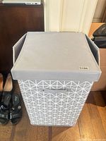 Grey fabric collapsible hamper with lid