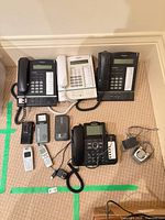 Group shot of all phones, portable devices and charger