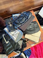 Pile of various purses and wallets