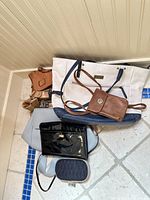 Overview of all six bags on floor