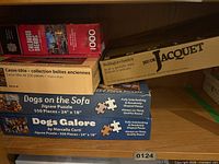 All five boxed items on shelf