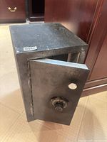 Front view showing combination dial and partially open door
