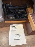 Singer sewing machine, carrying base, Kenmore manual