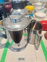 Chrome insulated coffee pot and detachable cup