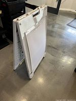 SimpoSign II A-frame sign, white panel side visible, folded stance