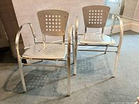 Both aluminum armchairs side by side
