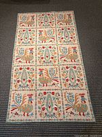 Full view of patterned wool rug on floor