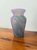 Front view of purple frosted art glass vase with drip glaze