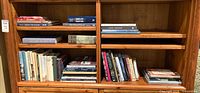 Full view of two bookcase sections filled with books