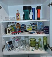 Full cabinet view showing all items across three shelves