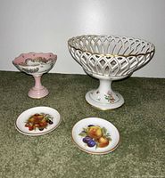 Group shot of all four porcelain pieces