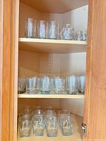 Cabinet shelves showing all glasses