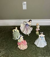 Group shot of all five figurines