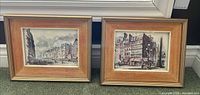 Both framed prints side by side