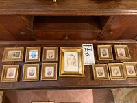 All framed items displayed on surface