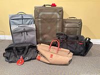 Group image showing all seven luggage pieces