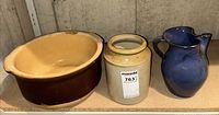Overview of bowl, crock and pitcher on shelf