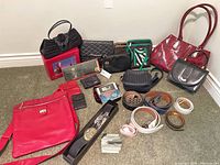 Group shot of all purses, wallets, belts and accessories
