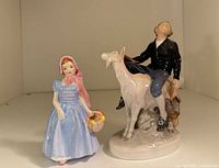 Both figurines side by side showing scale and overall appearance