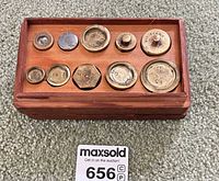 Weights seated in box with lot number