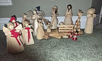 Entire nativity scene layout showing all figures and accessories
