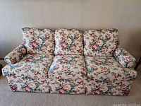 Front view of La-Z-Boy three-seat floral sofa showing overall style, cushions, arms and upholstery